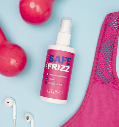 Leave-in Safe Frizz ao lado de halteres, fones de ouvido e top esportivo